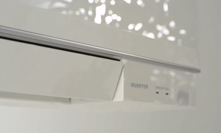 How does a split system air conditioner work?